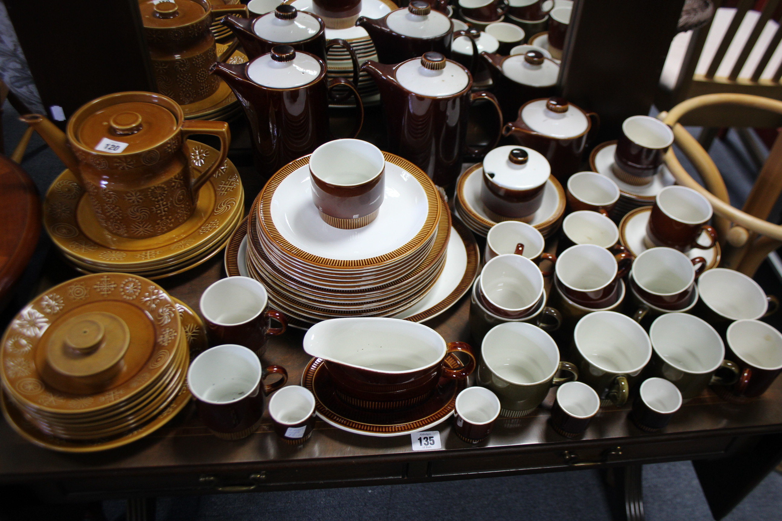 Twelve items of Portmeirion “Totem” pattern dinnerware; & various items of Poole pottery dinner &