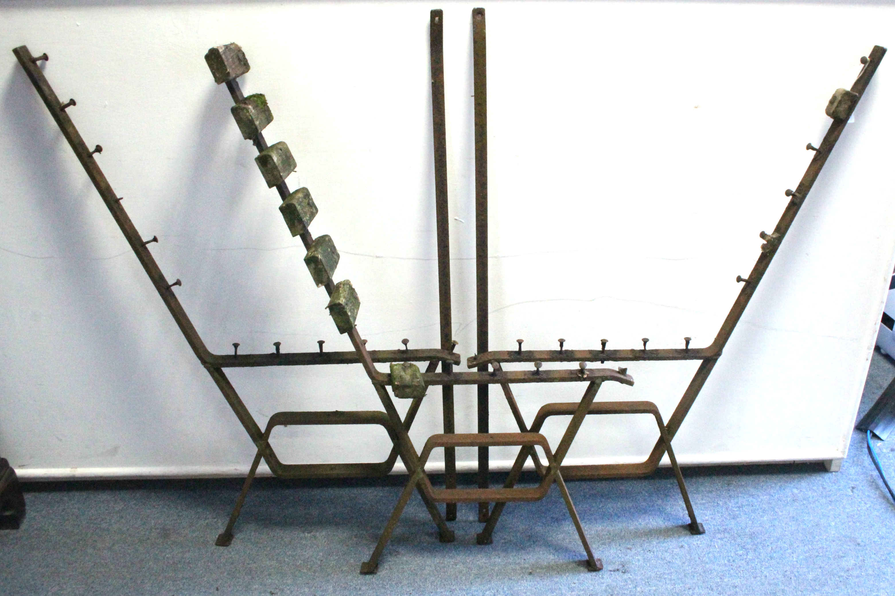 A set of three cast-iron garden bench supports, 38” high.