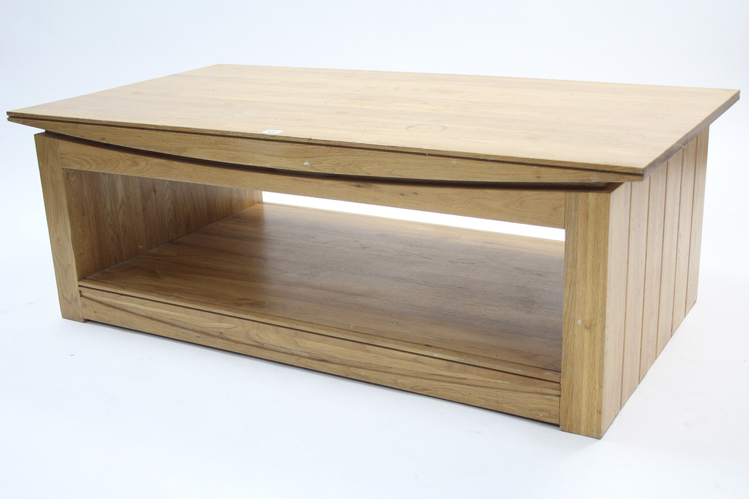 A light oak large rectangular two-tier coffee table, 51” x 27½”.