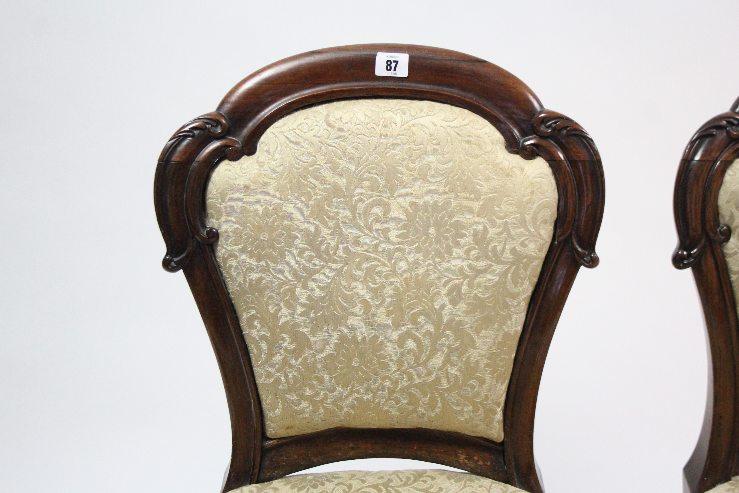 A set of four Victorian carved rosewood dining chairs, the padded balloon-backs & seats - Image 3 of 6