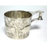 An Edwardian cup in the Etruscan style, of round slightly tapered form, embossed with a continuous