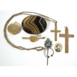 A 9ct. gold crucifix pendant; a smaller ditto on 9ct. chain necklet; a 9ct. gold Army Ordnance Corps