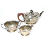 A George V three-piece tea service of oblong shape with canted corners & milled rims. Birmingham