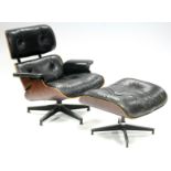 A HERMAN MILLER “670” LOUNGE CHAIR & OTTOMAN designed by CHARLES & RAY EAMES, the laminated rosewood
