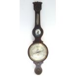 An early 19th century banjo barometer with silvered dial, in inlaid mahogany case with applied