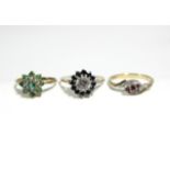 Two 9ct. gold gem-set dress rings; & a silver ditto.