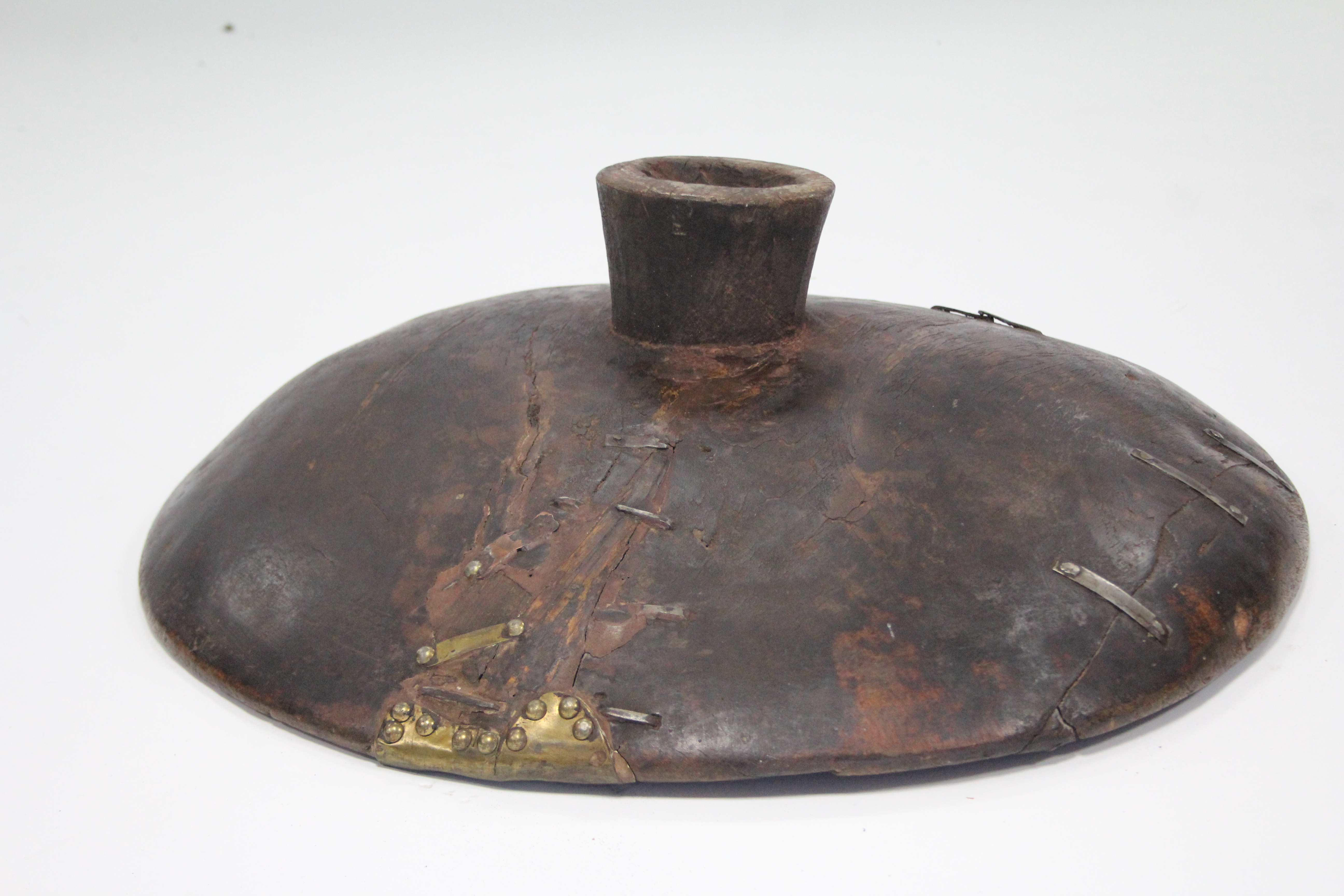 An antique Moroccan large wooden couscous bowl, on stem foot; 27” diam. (old rivet repairs). - Image 4 of 4