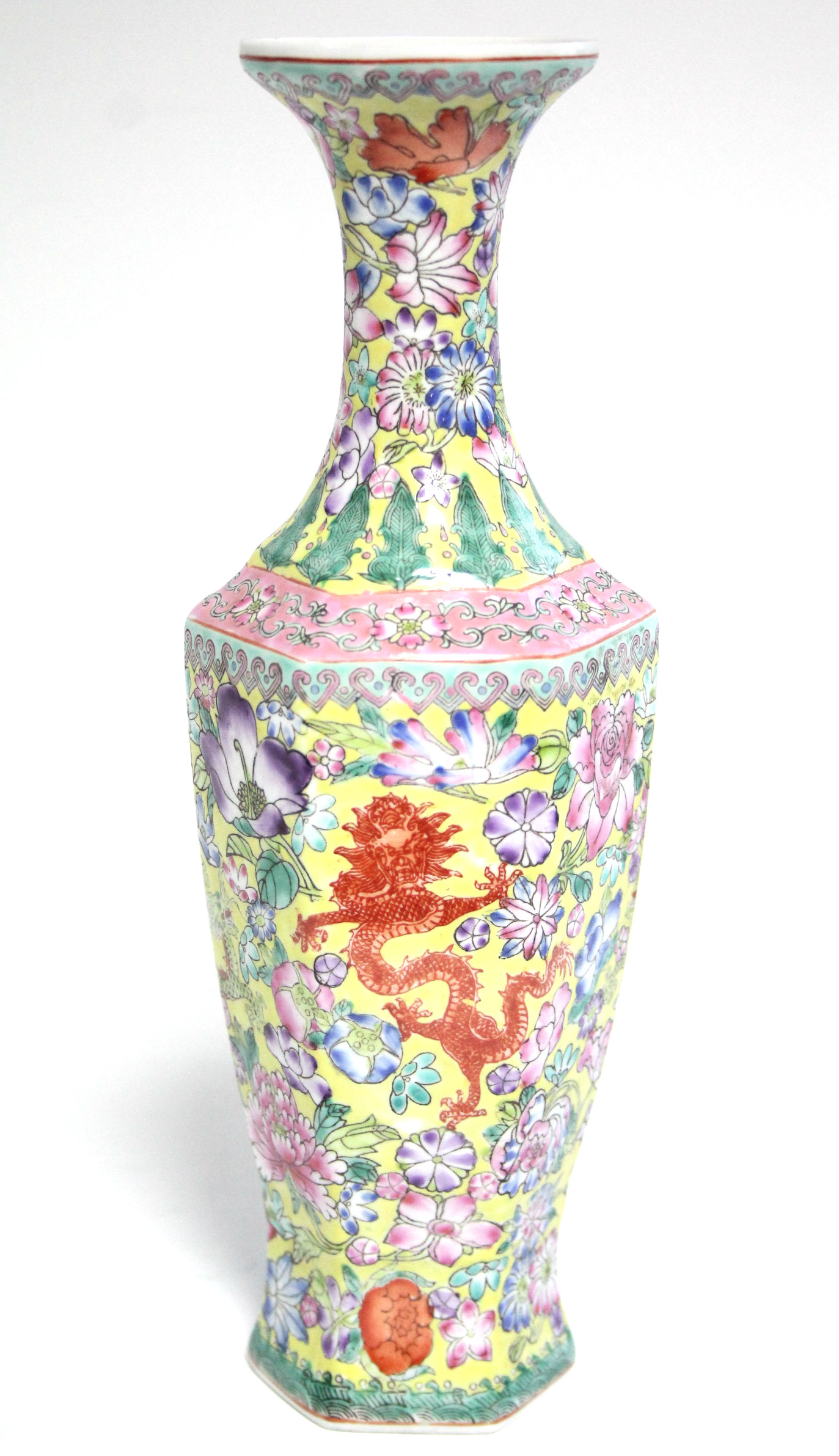 A 20th century Chinese yellow-ground eggshell porcelain slender hexagonal baluster vase with all-