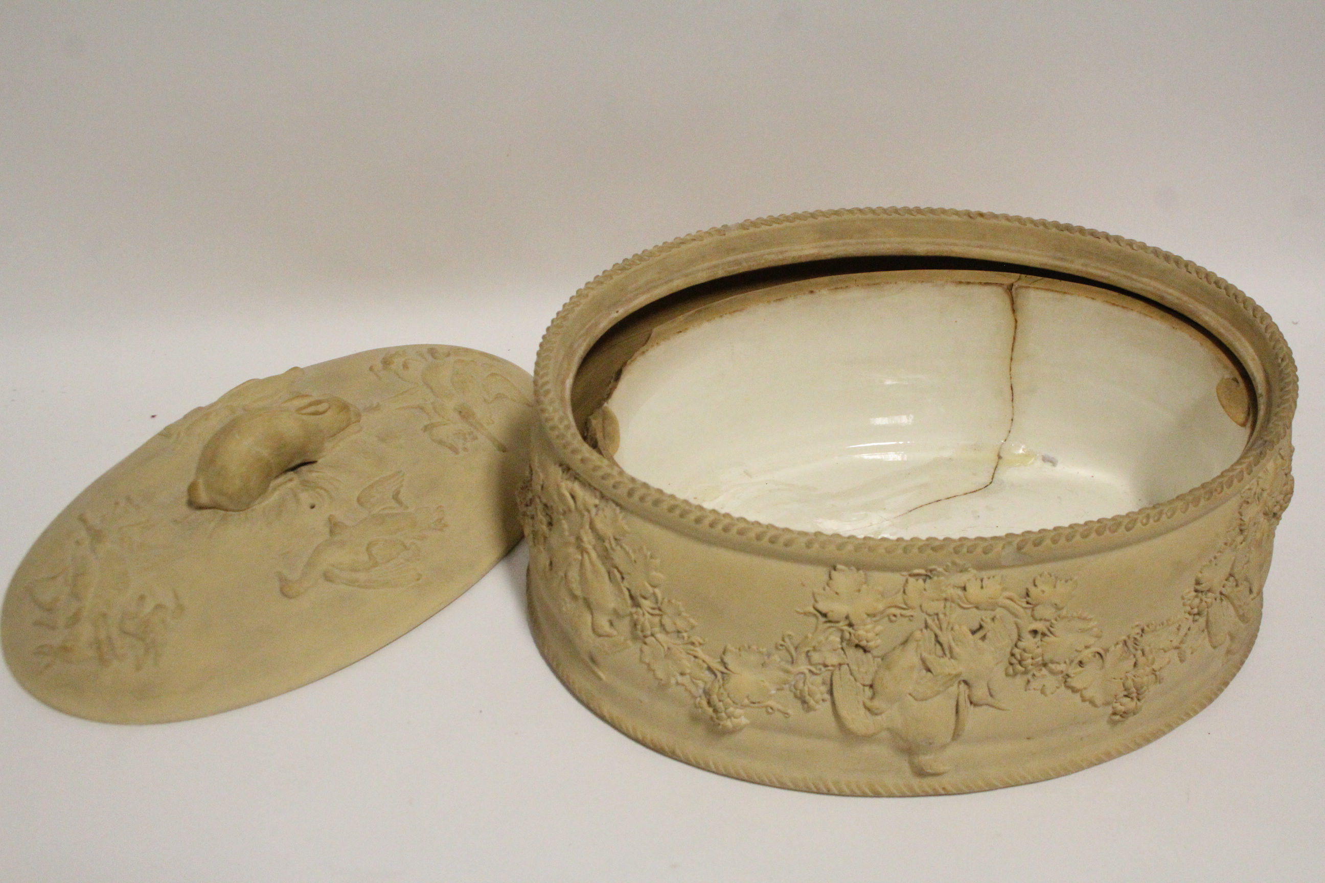 A 19th century Wedgwood caneware oval pie tureen with relief decoration of game birds & - Image 3 of 5