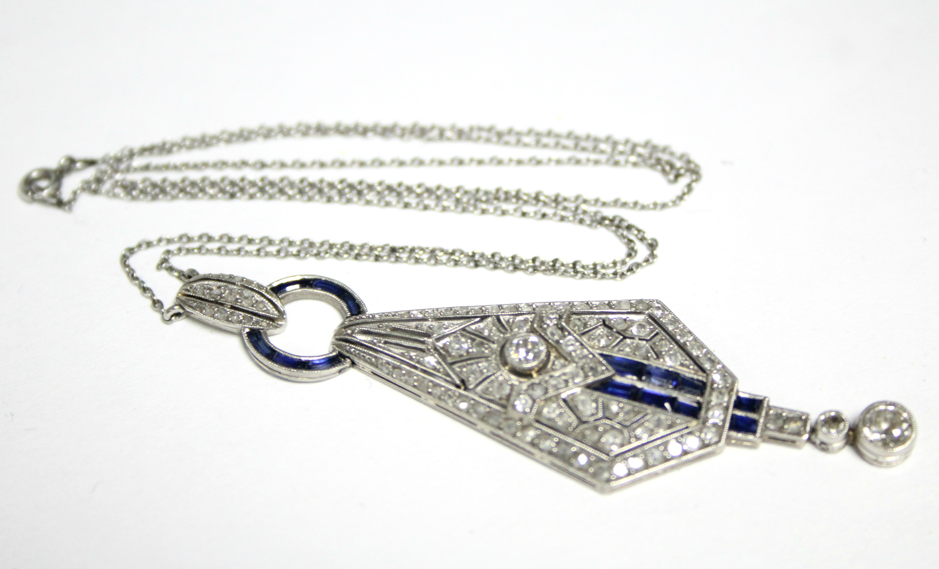 AN ART DECO DIAMOND & SAPPHIRE PENDANT of tapered angular form, set numerous graduated diamonds & - Image 4 of 6