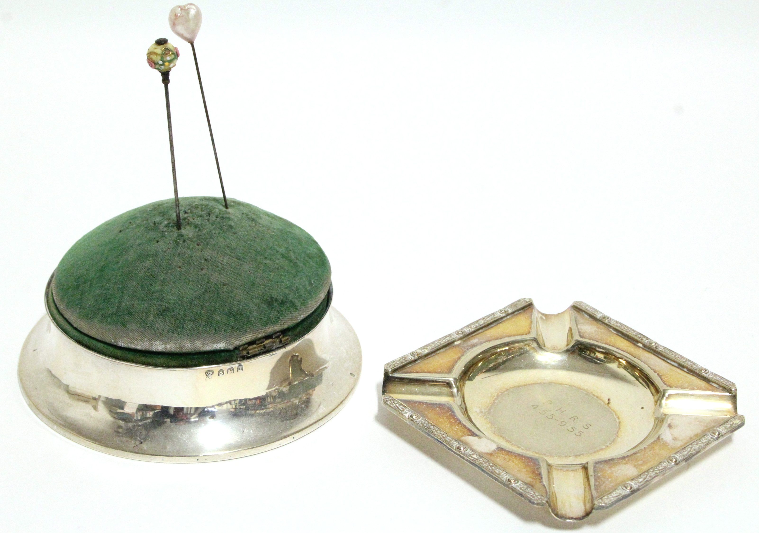 A large circular combination hat-pin cushion & ring box, the hinged padded top forming the lid,