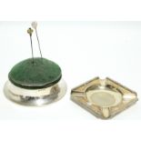 A large circular combination hat-pin cushion & ring box, the hinged padded top forming the lid,