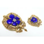 A VICTORIAN GOLD, BLUE ENAMEL, & DIAMOND BROOCH of oval shape with pierced leaf-scroll border &