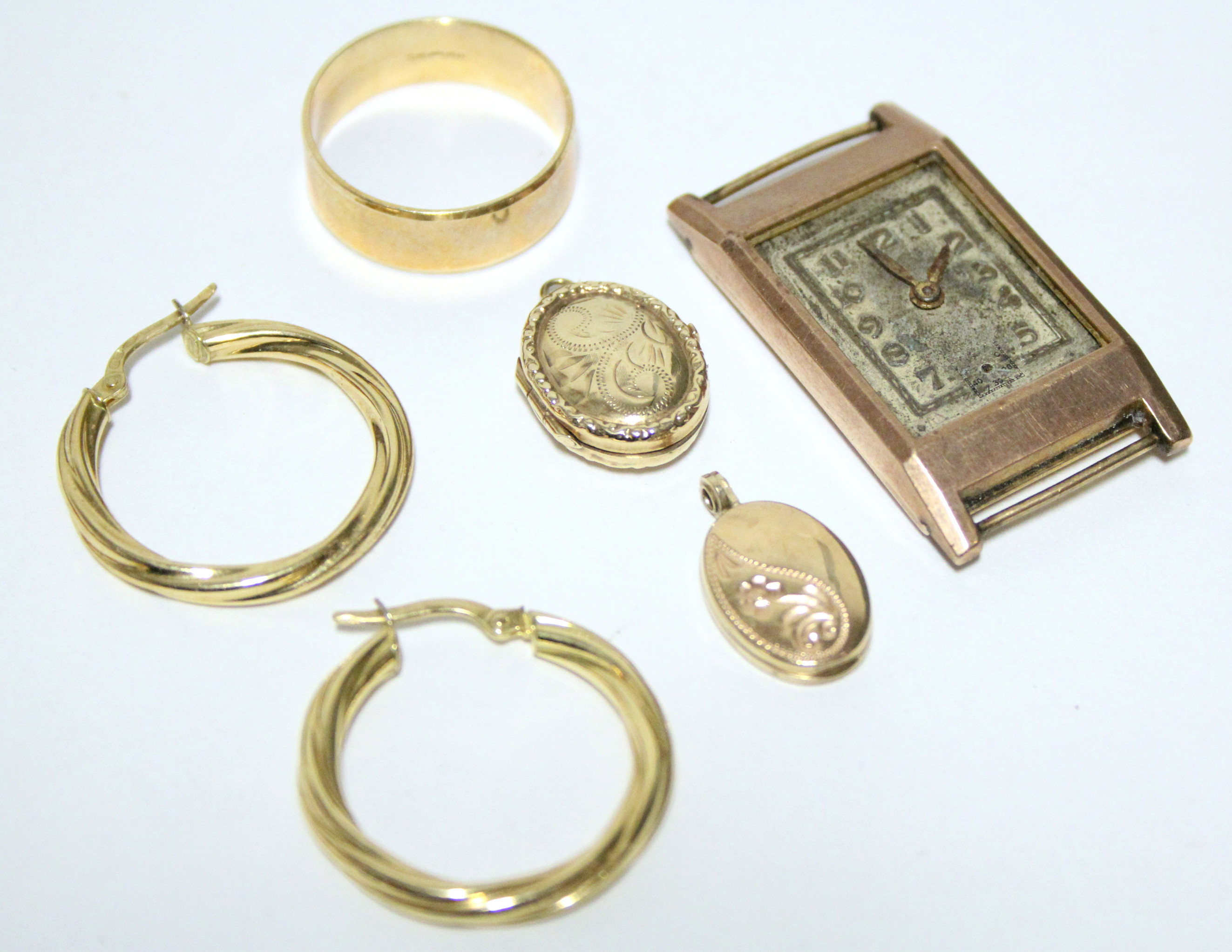 A 9ct. gold plain wedding band; a pair of 9ct. hoop earrings; two small 9ct. oval pendant lockets; & - Image 2 of 2