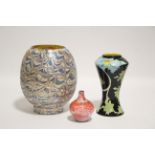 A Black Ryden pottery "Papaver" pattern slender waisted vase, 6½"; an art glass ovoid oil lamp