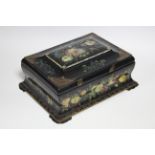 An early Victorian black lacquered papier mâche rectangular needlework box with painted & mother-