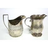 A George III upright oval milk jug with later embossed decoration, 4¼” high, London 1799; & a