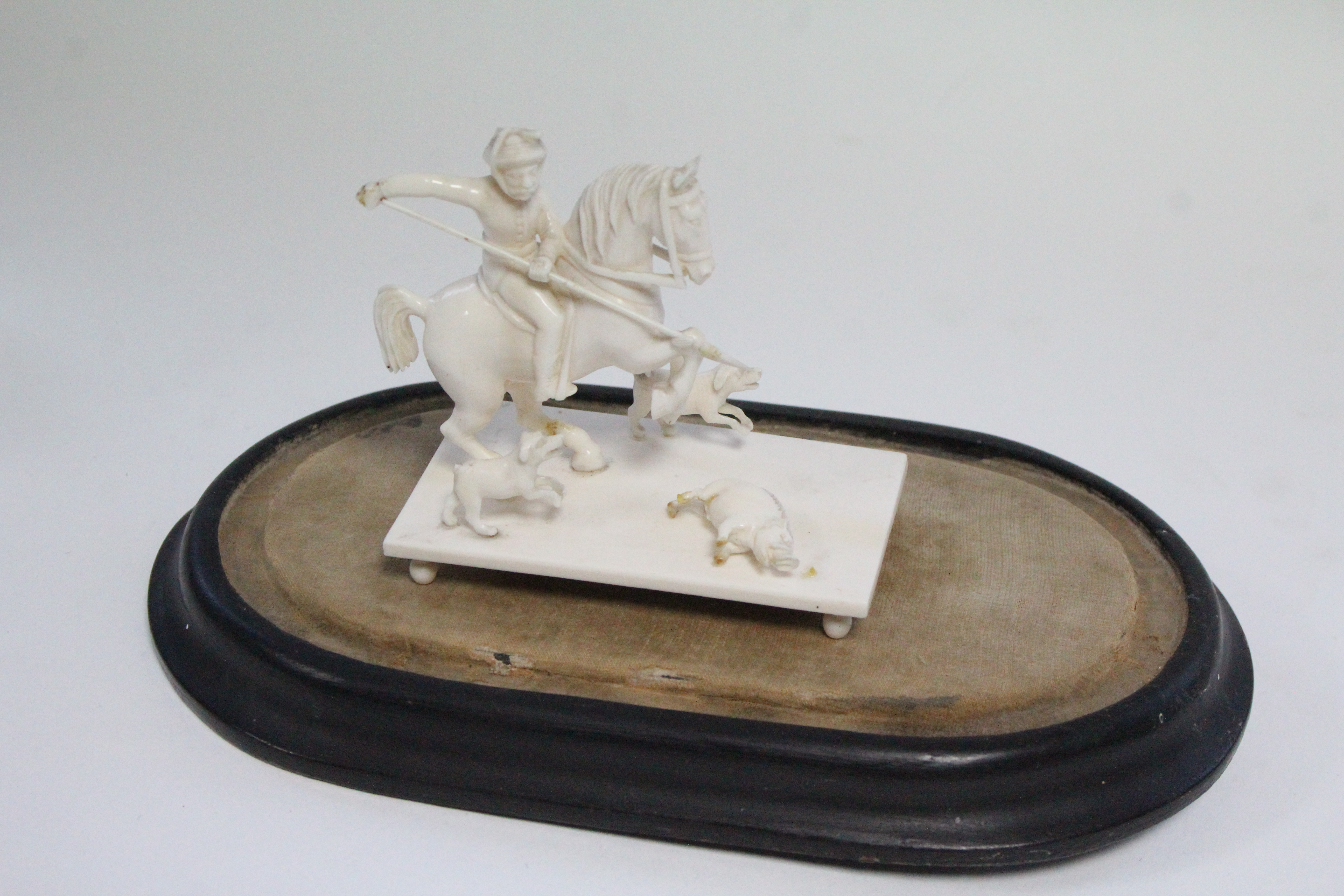 A 19th century Indian carved ivory equestrian group of a boar hunt, 3¼” high x 3½” wide; under glass - Image 2 of 2