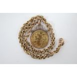 A George V half-sovereign, 1915, loose-mounted as a pendant, on 9ct. gold chain necklet.