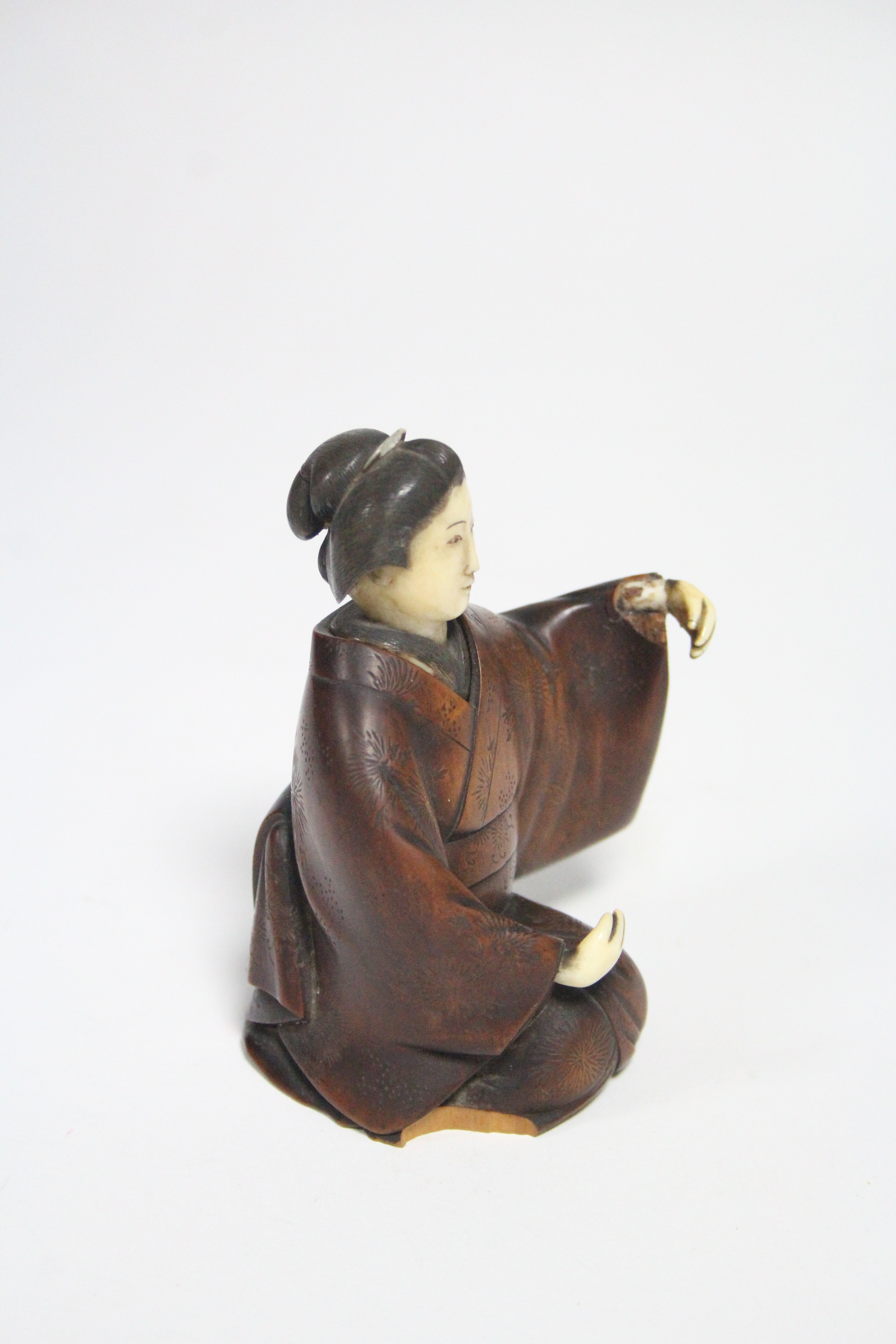 A late 19th century Japanese wood okimono of a kneeling Geisha, with ivory head & hands, signed on a - Image 2 of 7