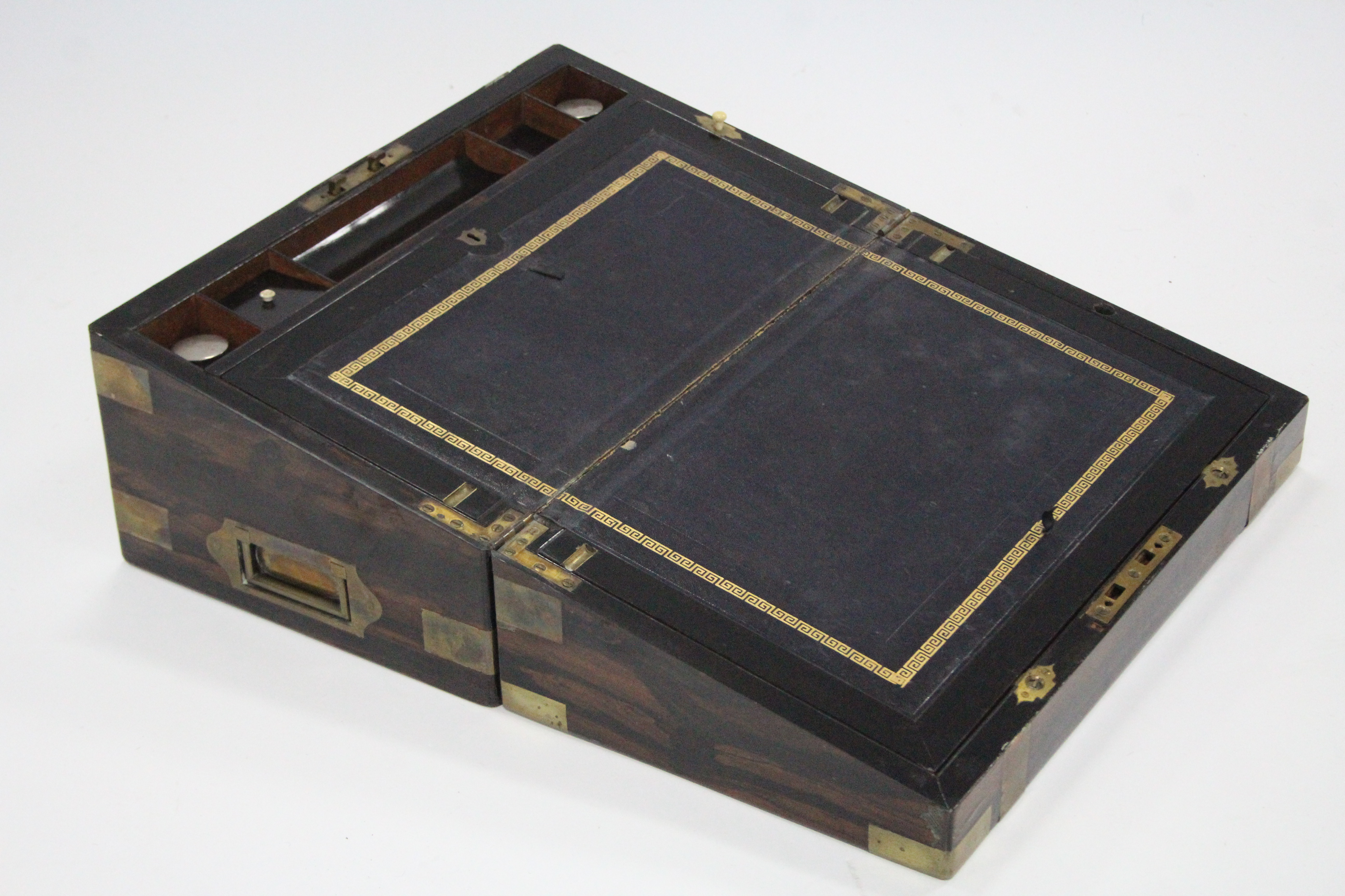 A Victorian brass-bound coromandel large writing slope with pair of glass inkwells to the fitted