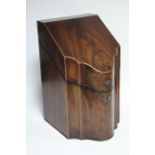 A George III figured mahogany knife box, the sloping hinged lid enclosing fitted interior, with
