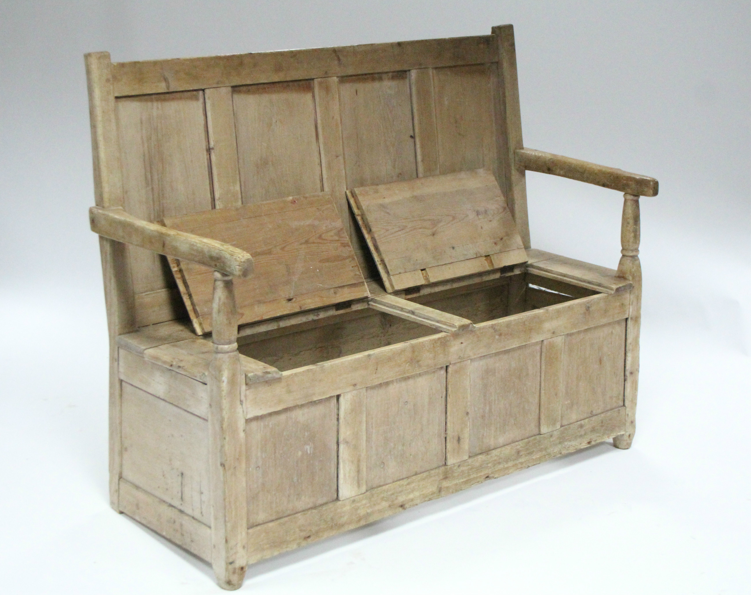 A 19th century pine box-seat settle with panelled back & open arms; 54” wide. - Image 2 of 4