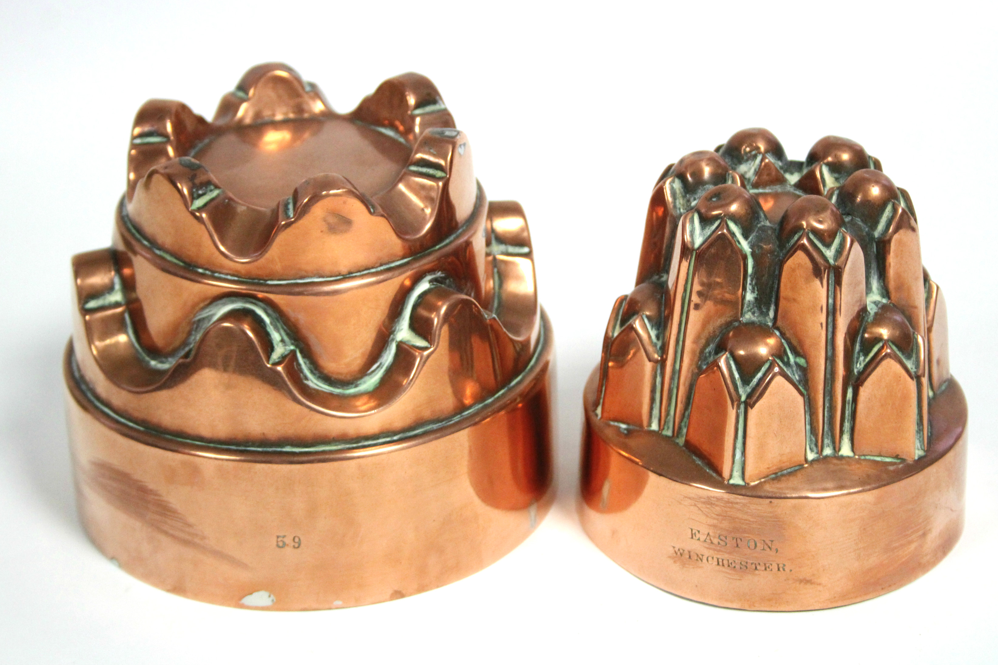 A late 19th/early 20th century copper jelly mould of crown design, 6” high x 4¾” diam.; & a