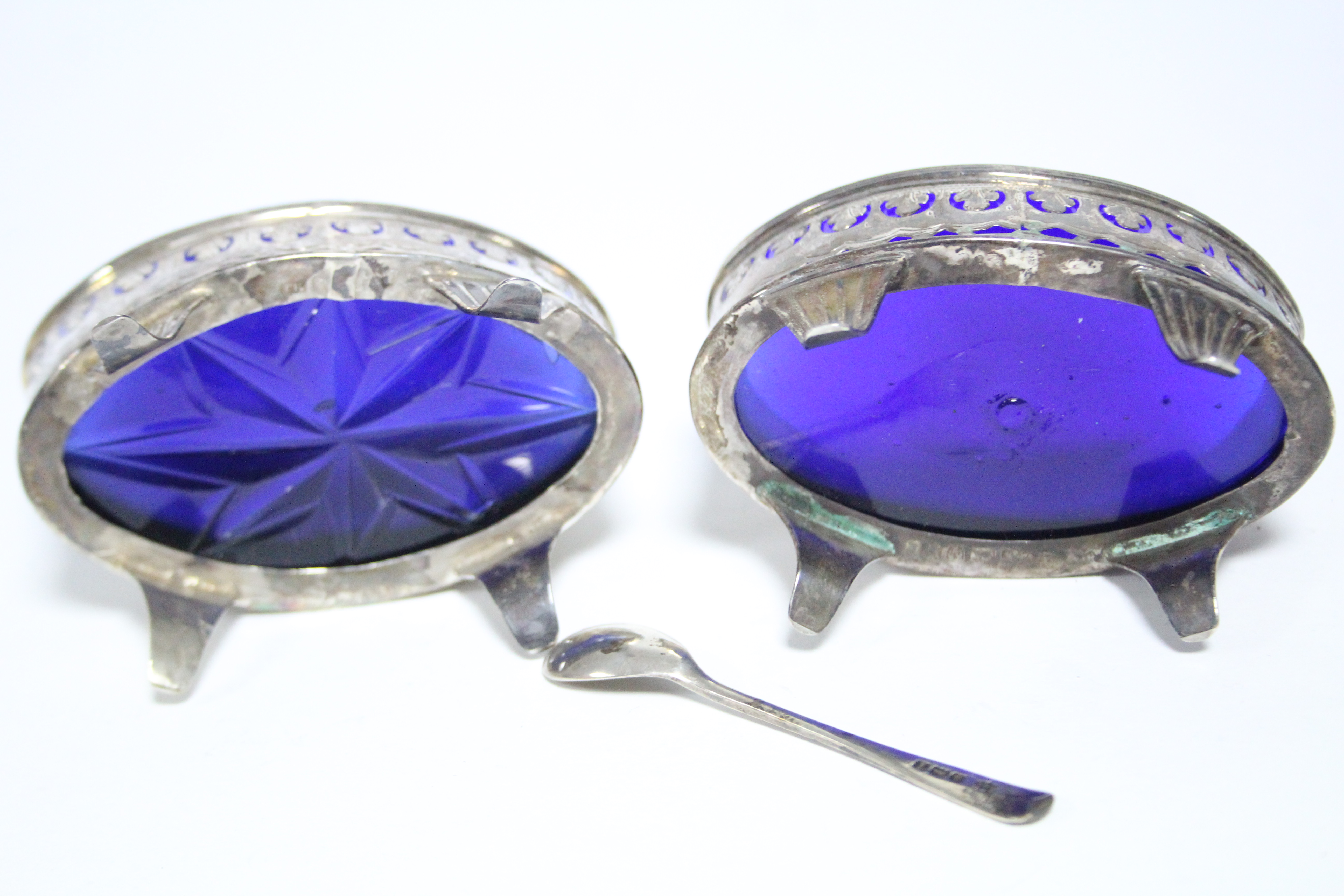 A pair of George III navette-shaped salt cellars with pierced & engraved straight sides, each on - Image 2 of 2