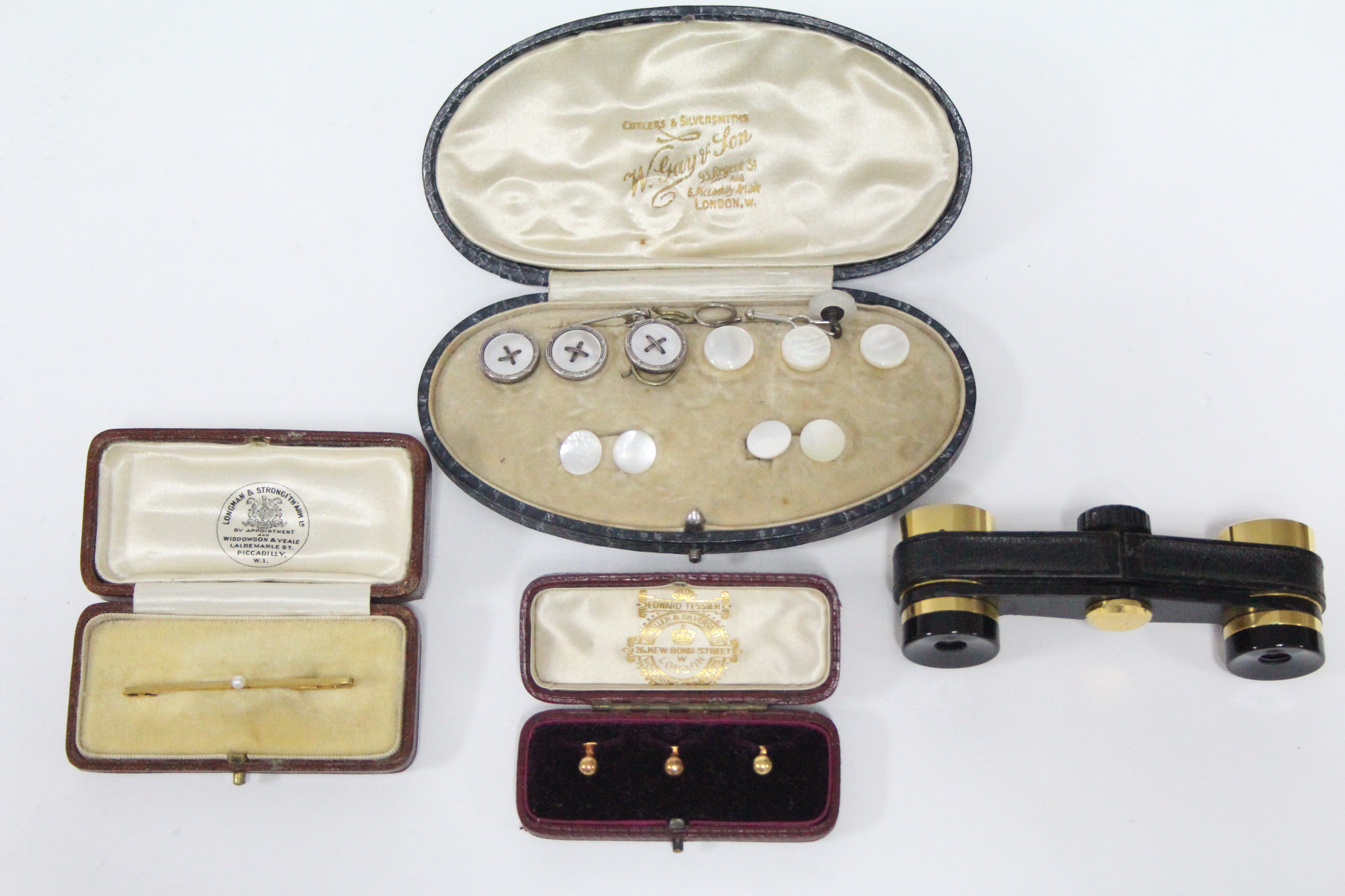 Three 18ct. gold shirt studs (3.8 gm), in original Tessier box; various mother-of-pearl shirt