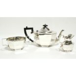 A George V three-piece tea service of octagonal oblong form. Birmingham 1934, by William Adams. (39