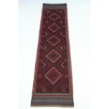 A Meshwari runner of blue, crimson & ivory ground with row of five lozenges within multiple borders;