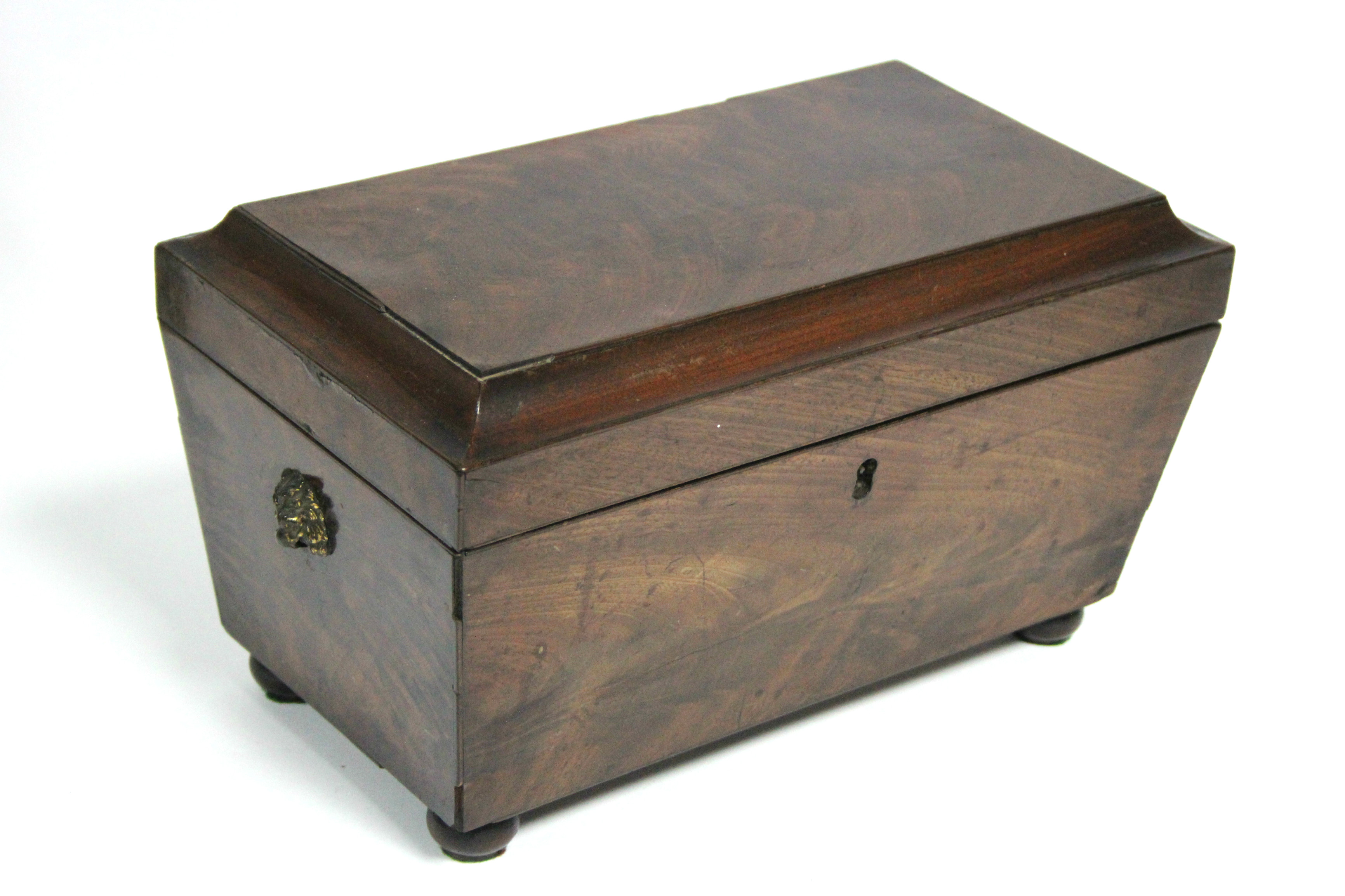 A regency figured mahogany rectangular tea caddy with tapered sides, brass lion-mask & ring side - Image 4 of 5