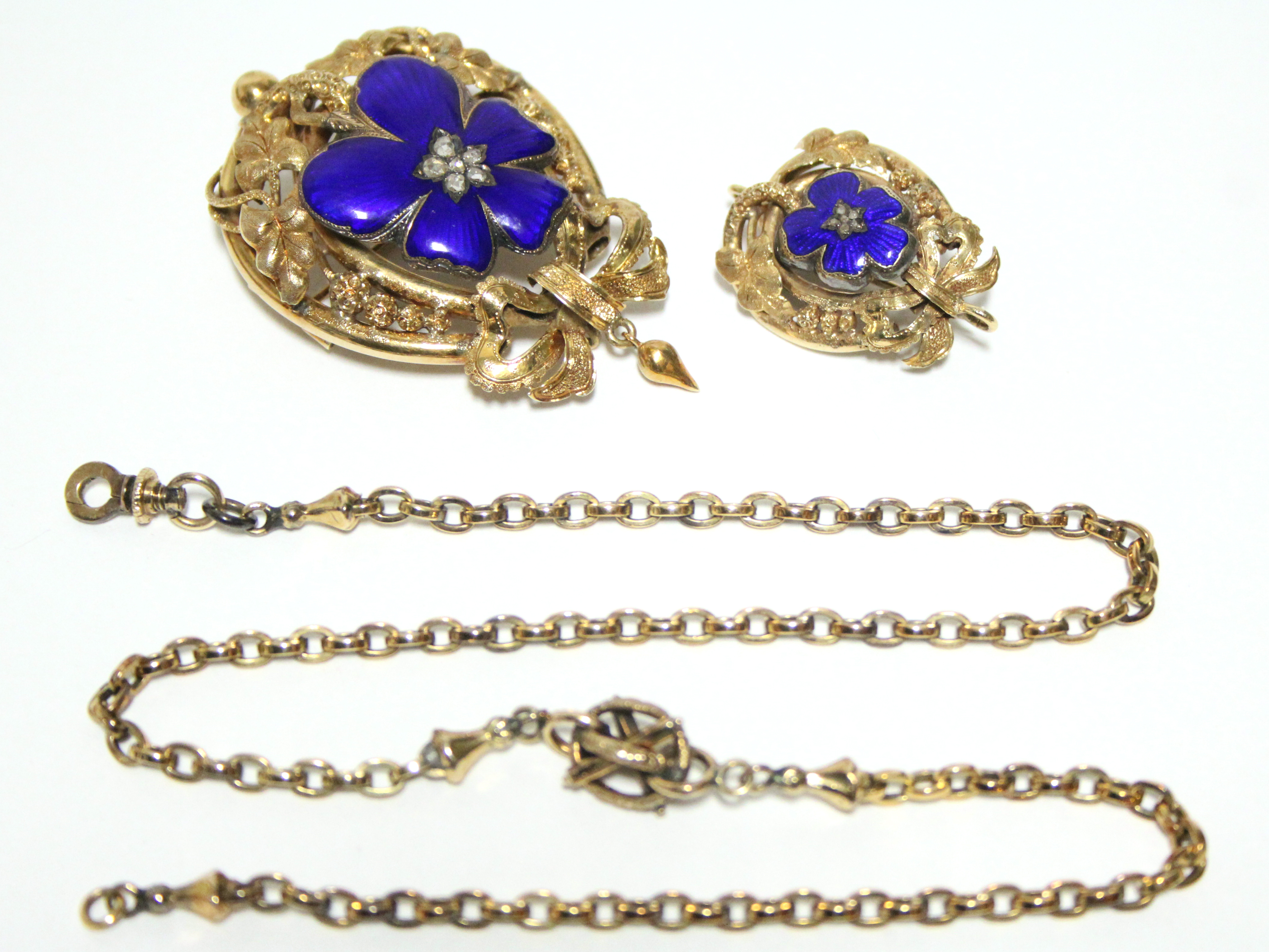 A VICTORIAN GOLD, BLUE ENAMEL, & DIAMOND BROOCH of oval shape with pierced leaf-scroll border & - Image 3 of 4