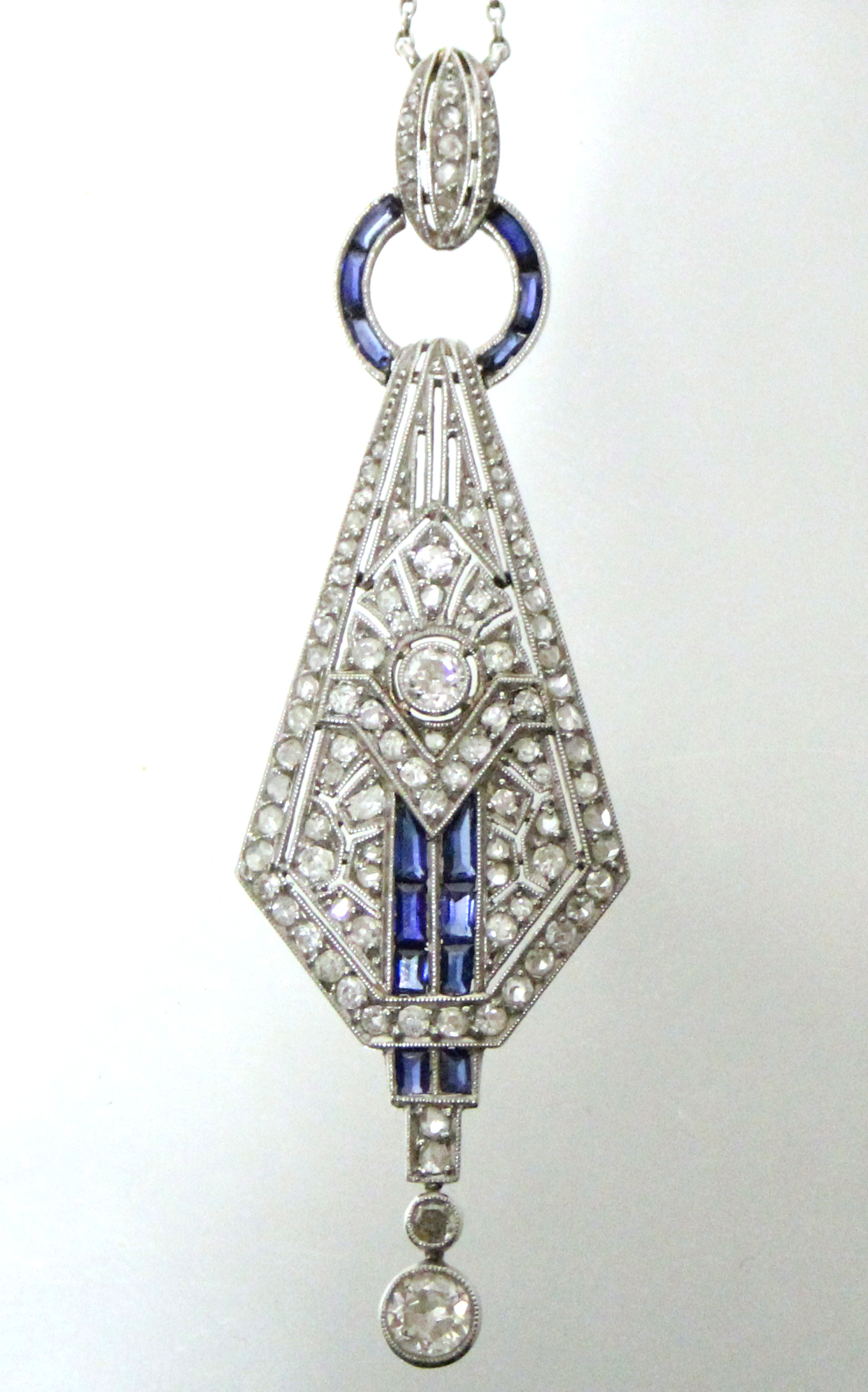 AN ART DECO DIAMOND & SAPPHIRE PENDANT of tapered angular form, set numerous graduated diamonds & - Image 2 of 6