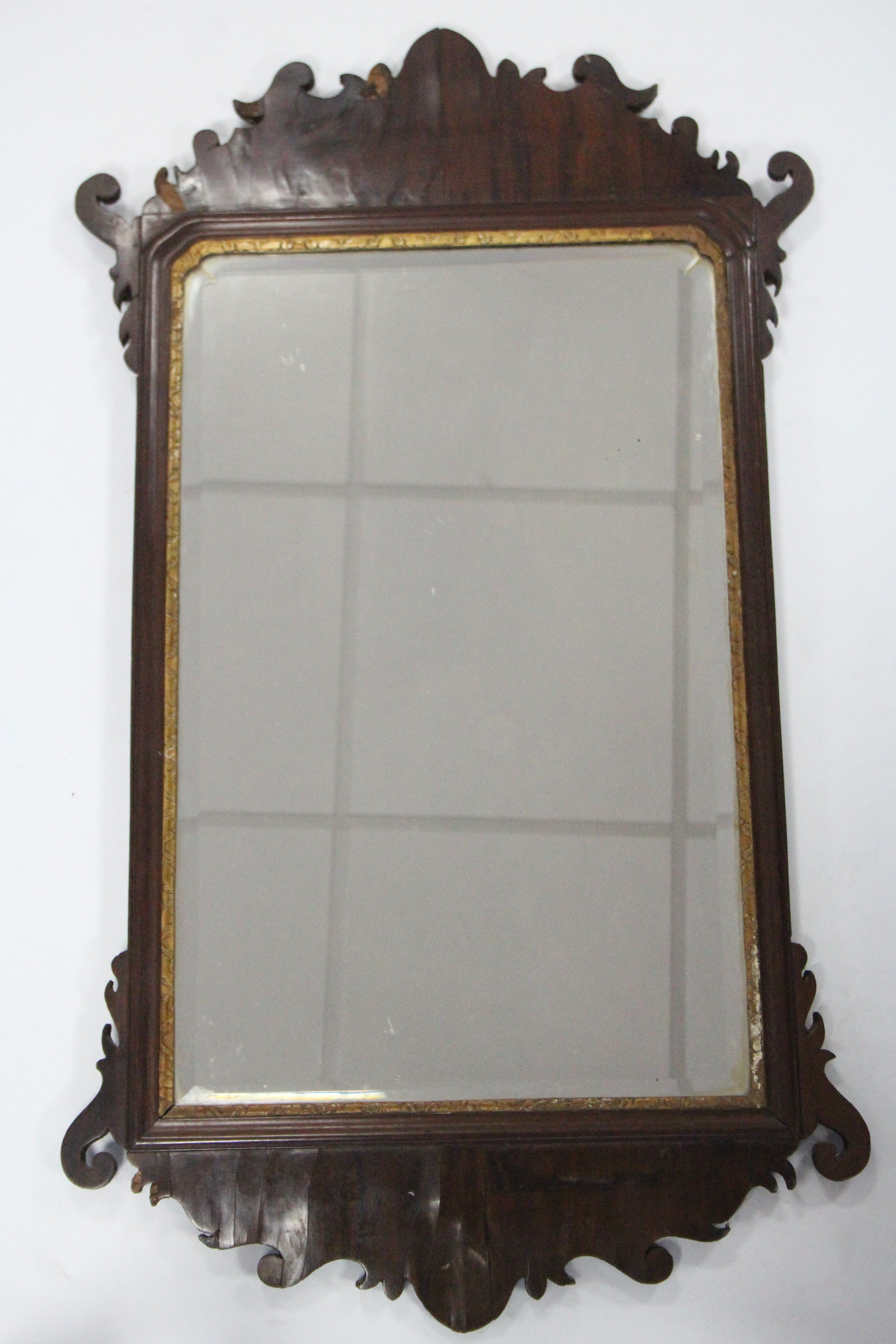An 18th century rectangular wall mirror inset bevelled plate, in mahogany frame with fret-carved - Image 2 of 2