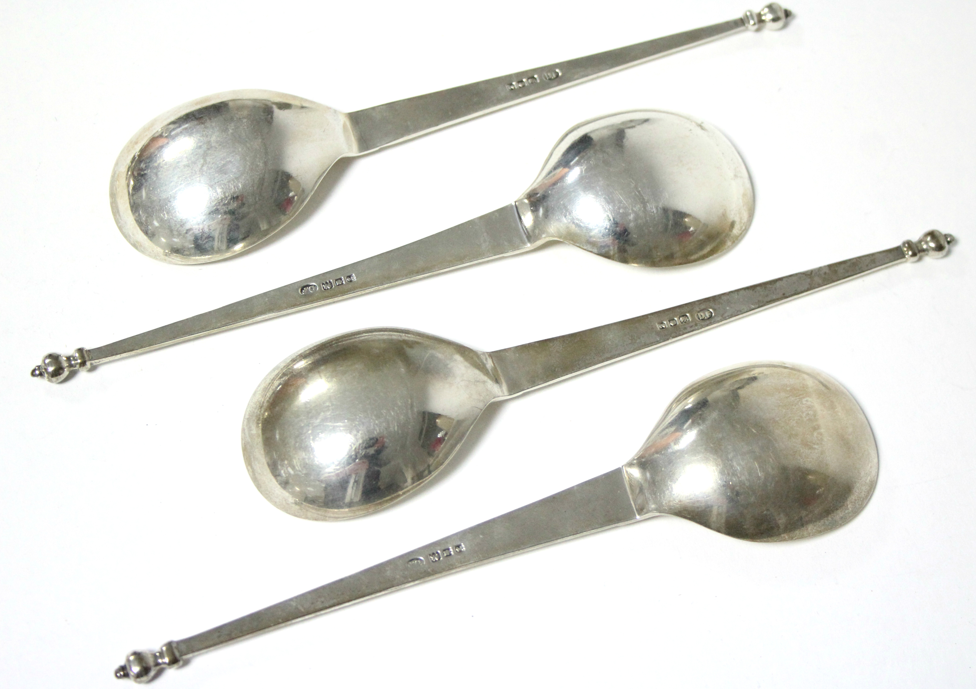 A set of four serving or soup spoons, each with baluster knop to the long flat tapered stem, & - Image 2 of 2