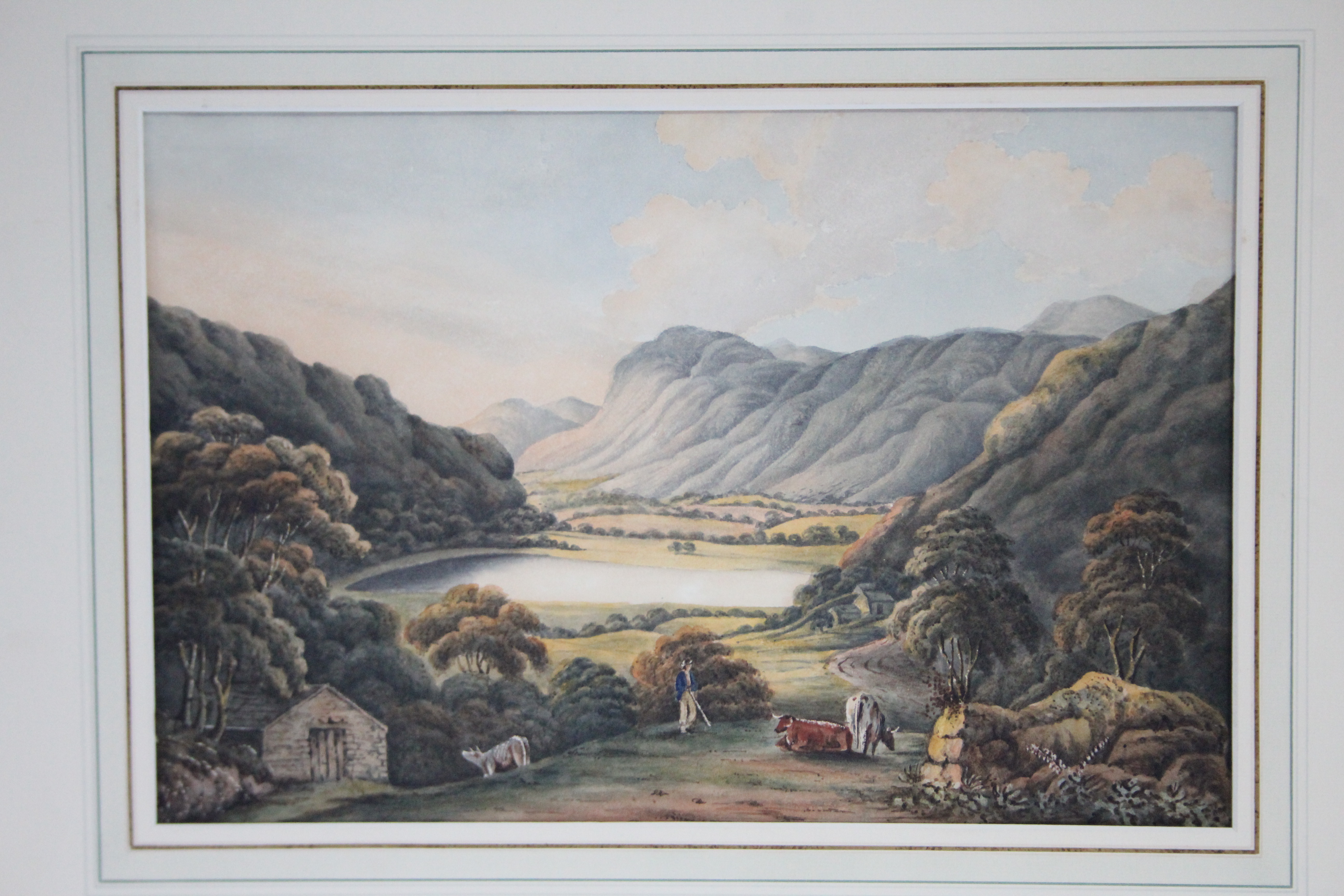 ENGLISH SCHOOL, early 19th century. A view of Brothers Water from the South, with a figure &