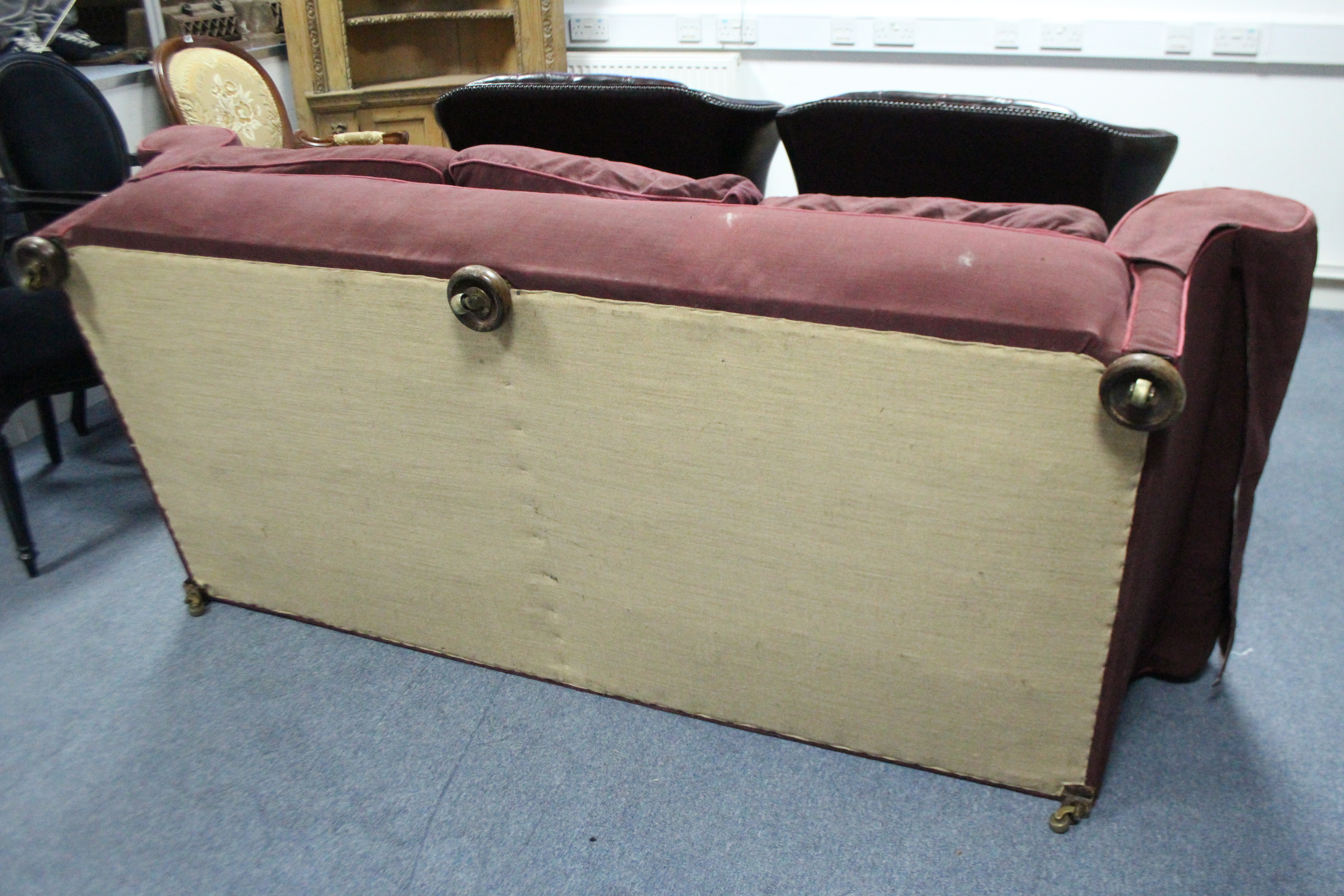 An early 20th century three-seat sofa upholstered burgundy fabric, with rounded buttoned back, - Image 4 of 5