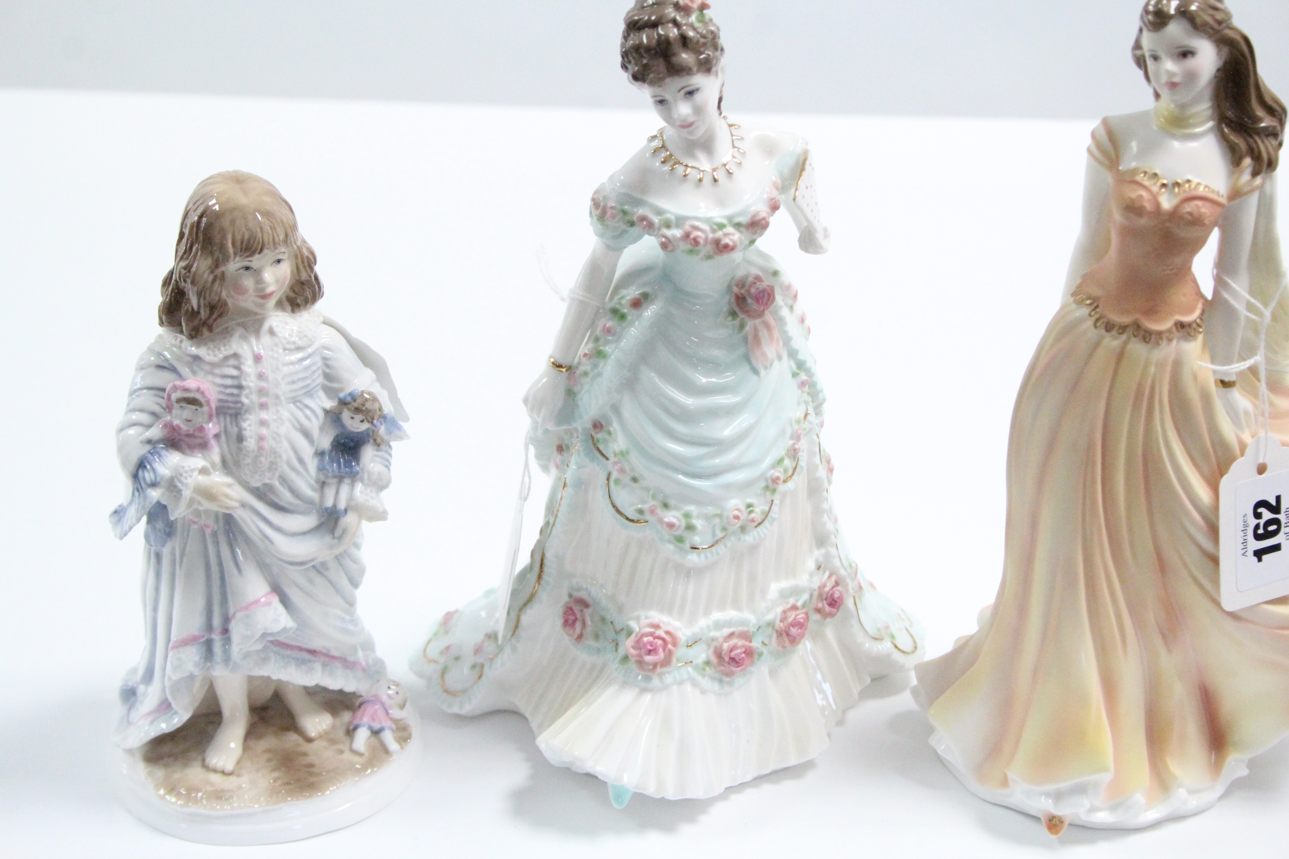 Four Royal Worcester bone china figures “A Royal Anniversary”, “Emily”, “Lullaby”, & “Wistful”. - Image 2 of 4