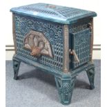 A Brevette “No. 406 Noel” Pied Selle turquoise enamelled cast-iron wood burner, 20¼” wide.