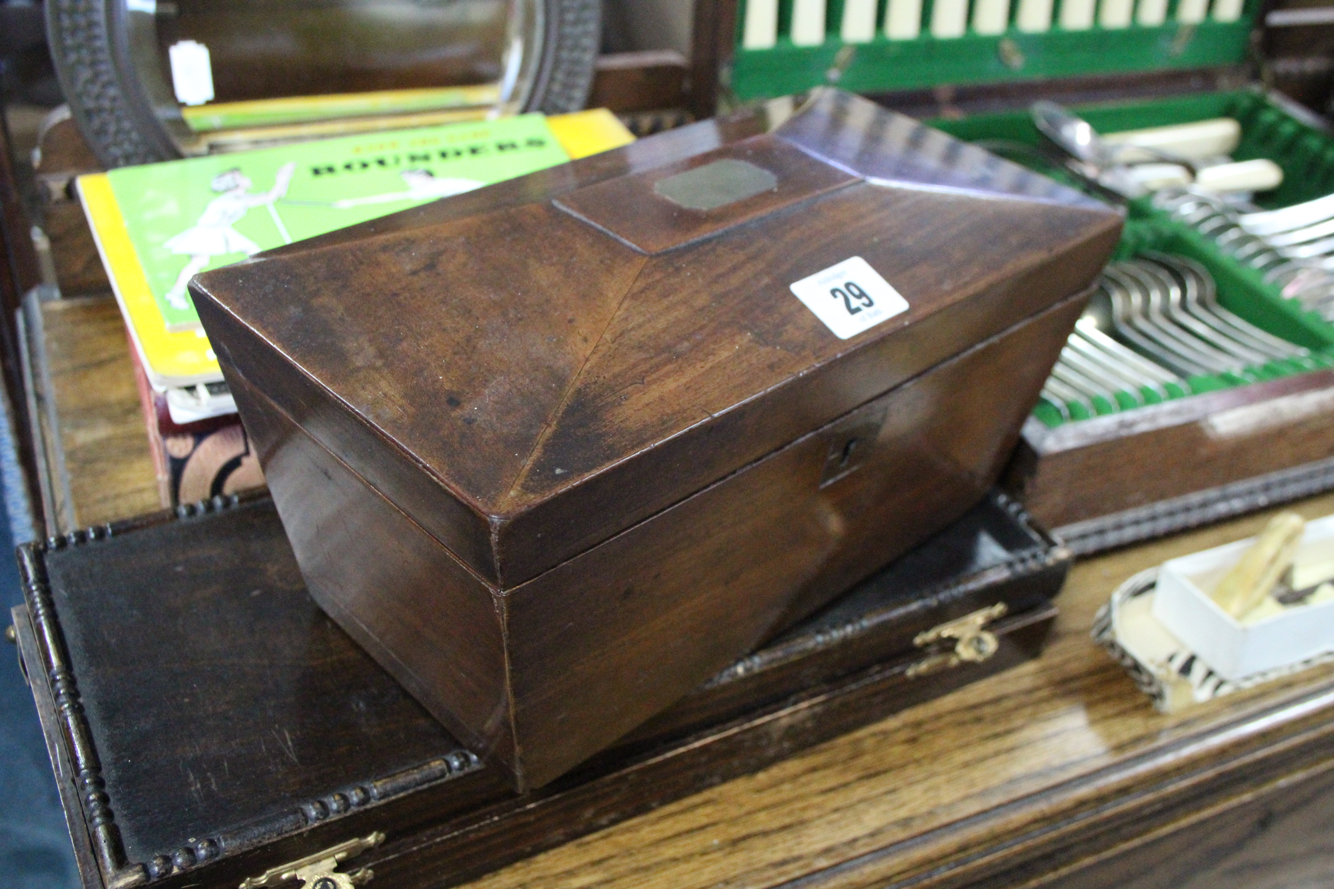 A 19th century mahogany tea caddy (w.a.f), 10¾” wide; two canteens of cutlery; various items of