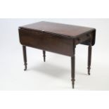 A 19th century mahogany Pembroke table fitted end drawer, & on spiral-twist legs with steel castors,