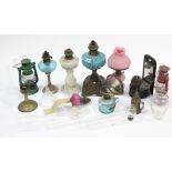 Seven various oil lamps; & three hurricane lamps.