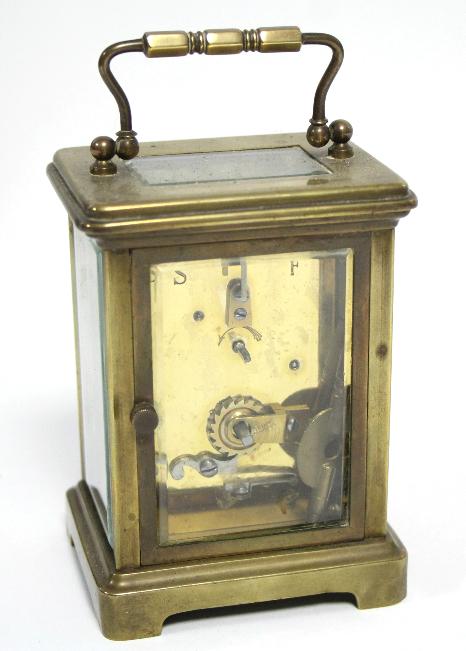 A brass cased carriage timepiece with black roman numerals to the white enamel dial; 4¼” high. ( - Image 2 of 4