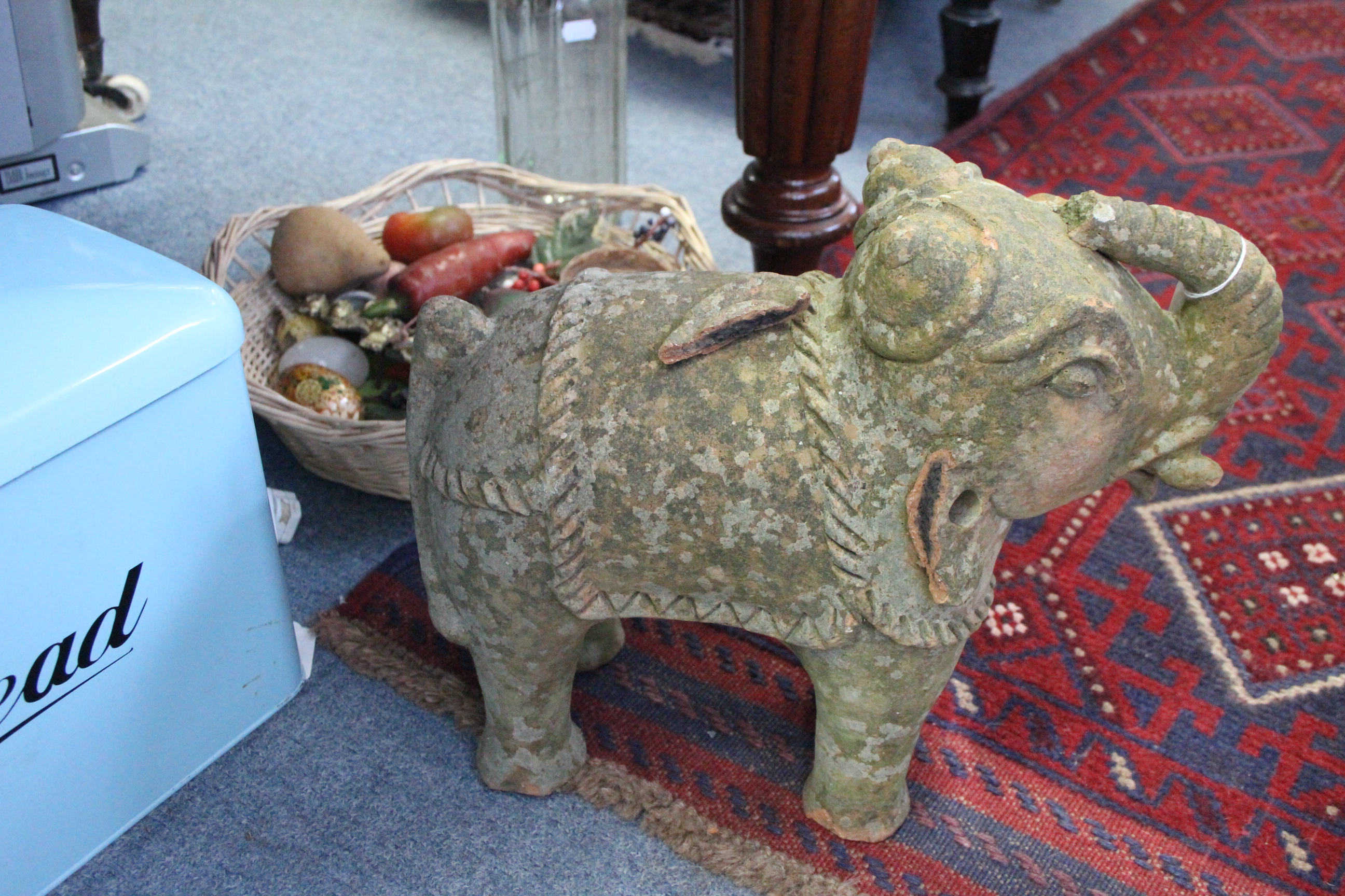 A terracotta ornament in the form of an Indian elephant, 12½” high (w.a.f.); an iron-bound oak - Image 2 of 2