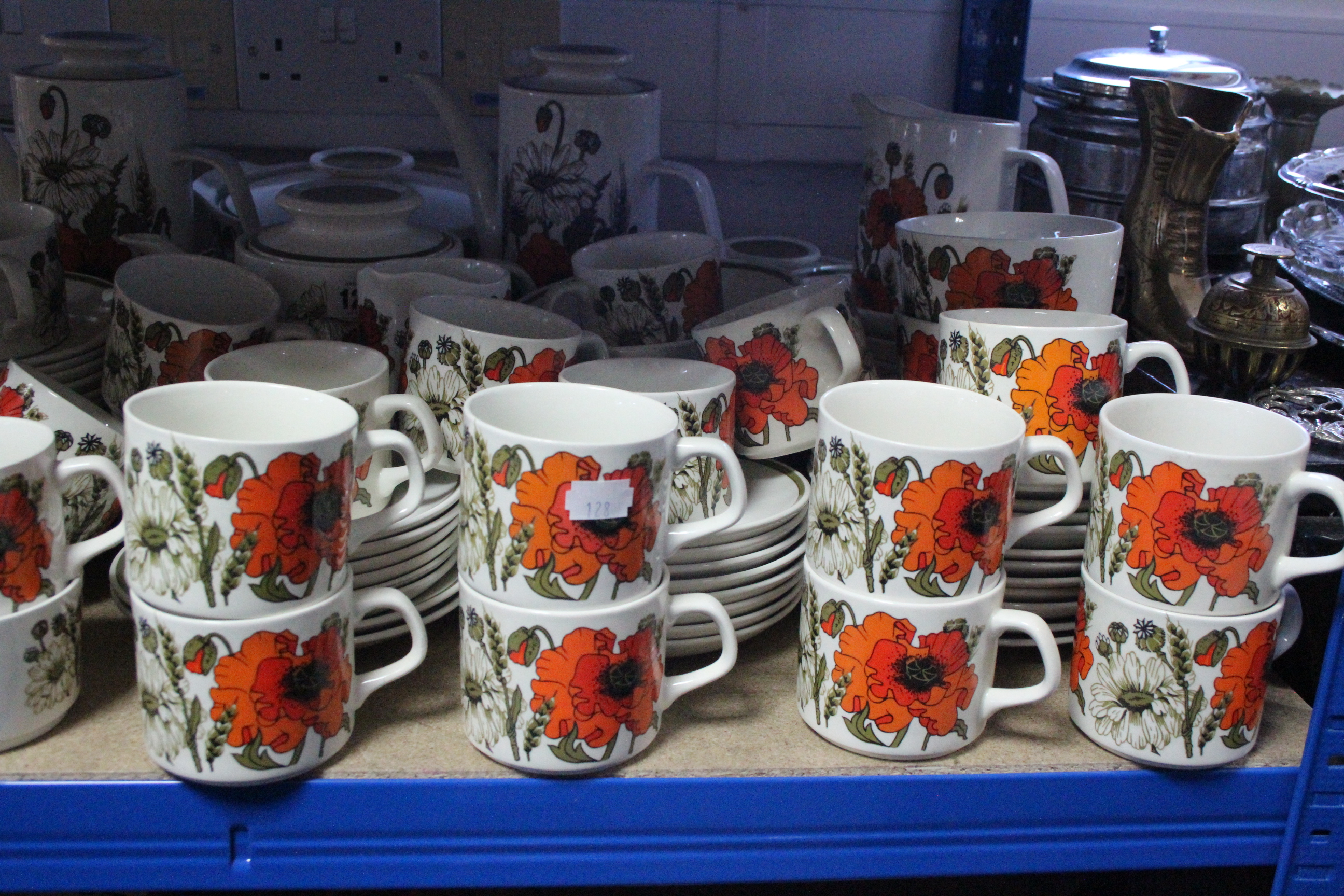 Approximately sixty various items of Meakins “Poppy” pattern dinner, tea & coffeware.