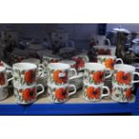 Approximately sixty various items of Meakins “Poppy” pattern dinner, tea & coffeware.