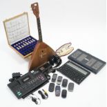 A Yamaha “RX8” digital rhythm programmer, w.o.; a Cambridge “Z88” portable computer; a chess set;