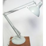 A thousand Tone Lamp Co. large anglepoise desk lamp; together with three table lamps bases; a